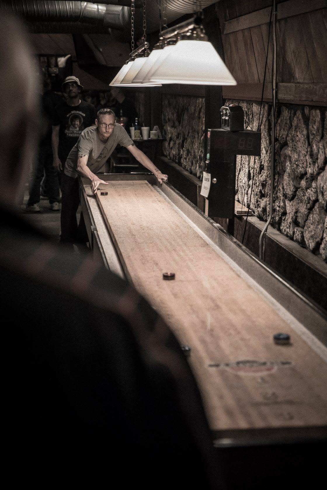 Table shuffleboard at Madison Park Bowl