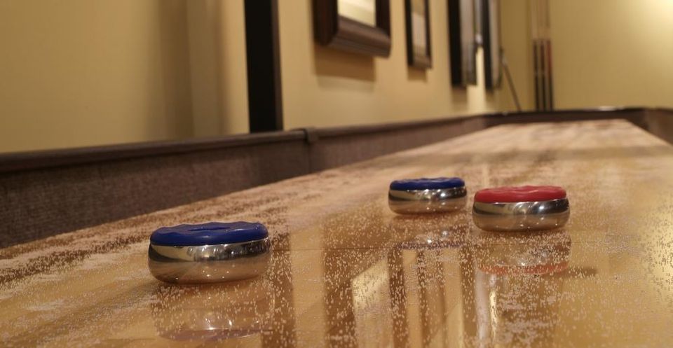 Pool, soft-tip darts and table shuffleboard at Madison Park Bowl